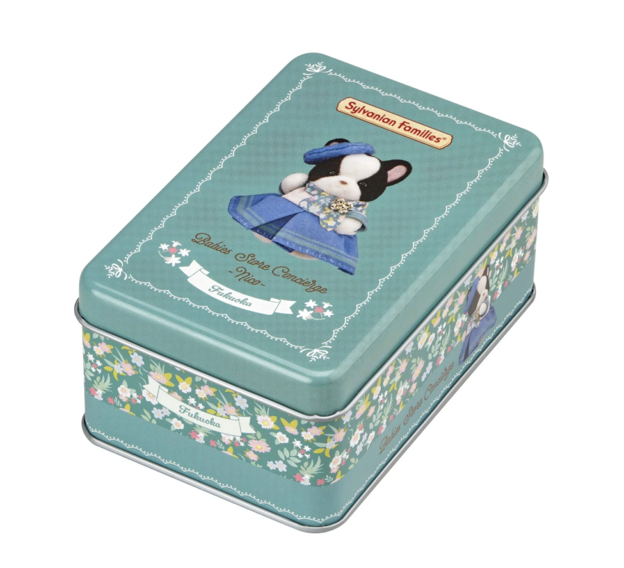 ミントグリーンのブリキ缶で、蓋にはシルバニアファミリーのフレンチブルドッグの赤ちゃんが描かれている