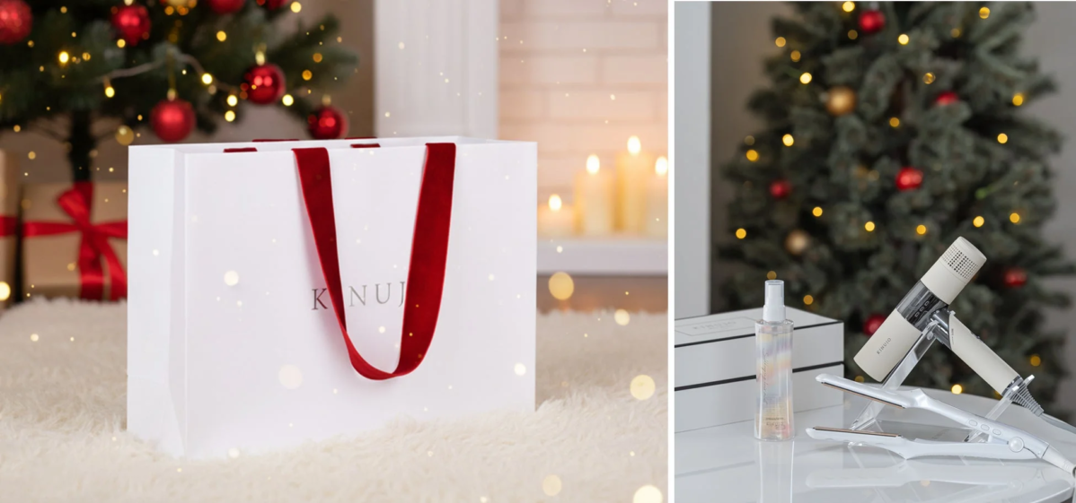 クリスマスツリーやキャンドルが飾られた暖かな雰囲気の中、白いショッピングバッグとKINUJOブランドのヘアアイロン、ヘアドライヤー、ヘアオイルなどの美容家電が並べられています