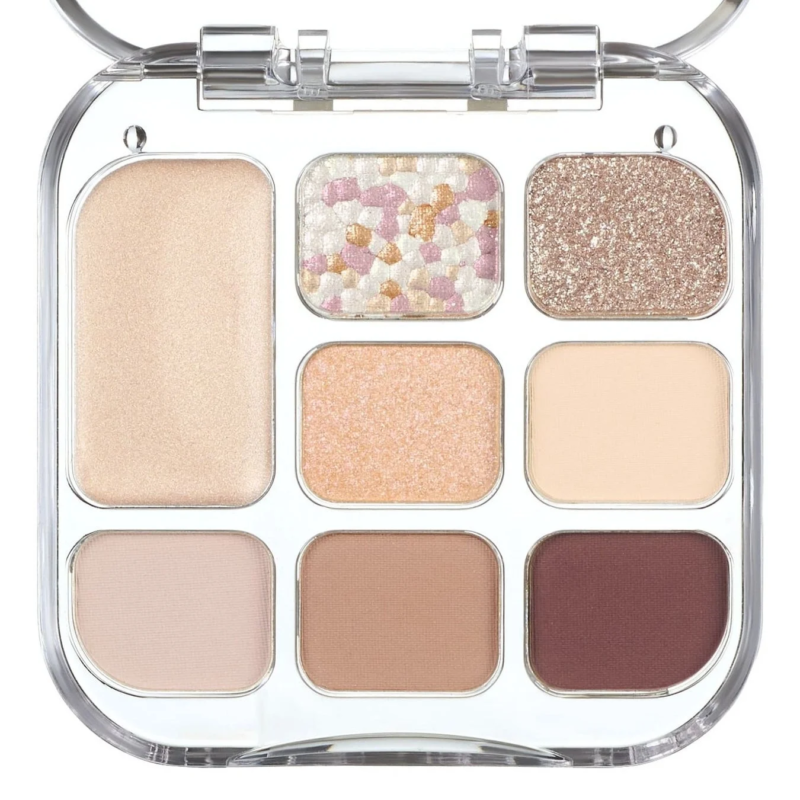 透明なケースに入った9色のアイシャドウパレット。ベージュ、ブラウン、ゴールド、ピーチ系の暖色を中心に、マット、シマー、グリッターの多様な質感が楽しめる。日常使いに最適なコスメアイテム。