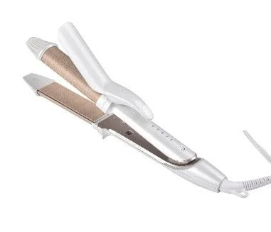 白いボディと金色のプレートを持つヘアアイロンが白い背景に置かれています