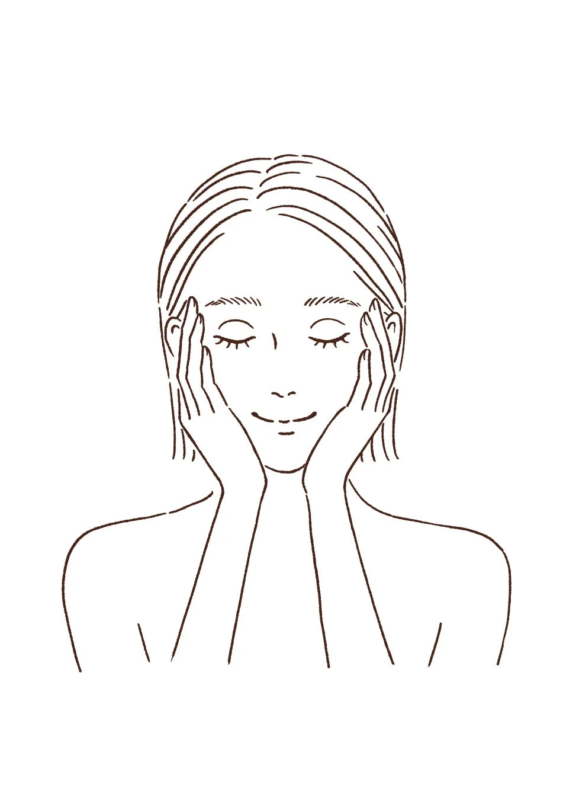 美容液をなじませる女性のイラスト