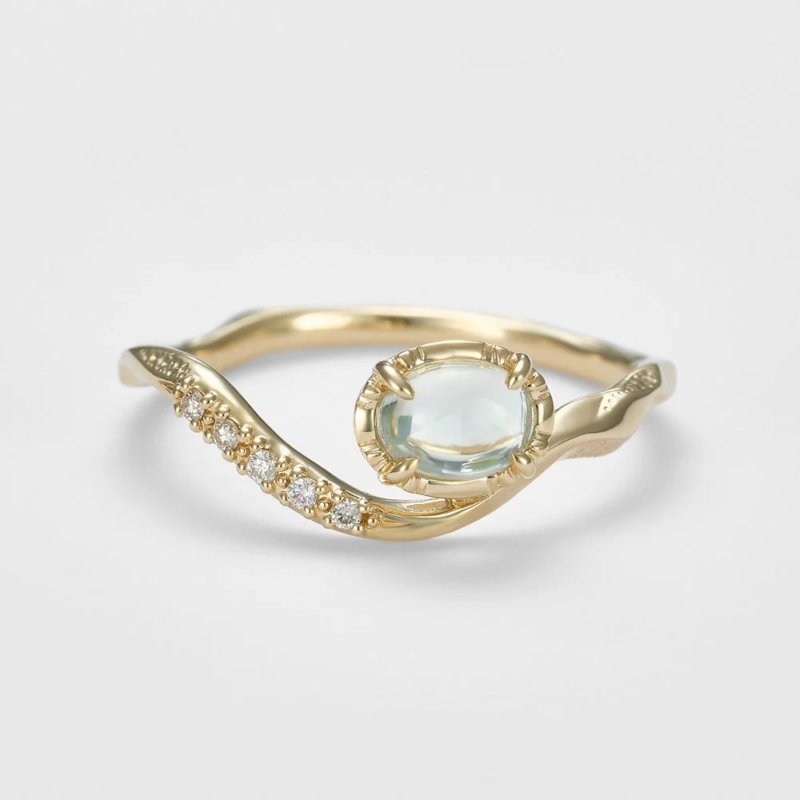 オーバルカット宝石のゴールドリング