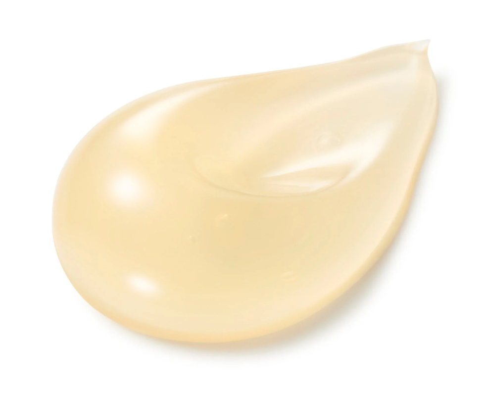 光沢のある淡い黄色のジェル状またはクリーム状の美容製品