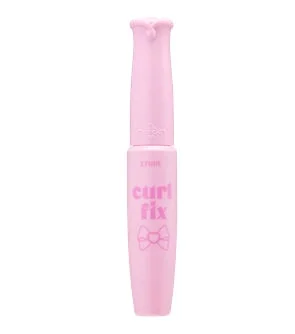 ピンク色の容器に入った「ETUDE curl fix」というブランドのマスカラです。上部には小さな装飾があり、中央にはリボンのロゴが描かれています。
