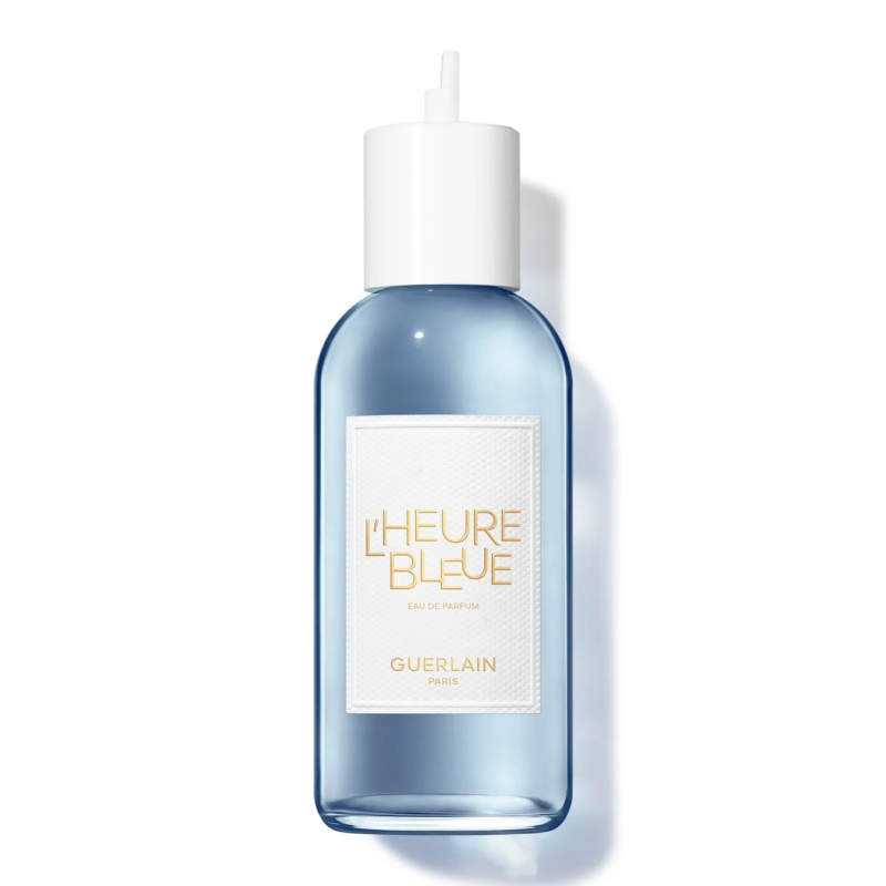 装有蓝色液体的GUERLAIN香水“L'HEURE BLEUE”瓶身