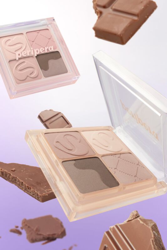 The peripera Ink Pocket Shadow Palette surrounded by chocolate bars
