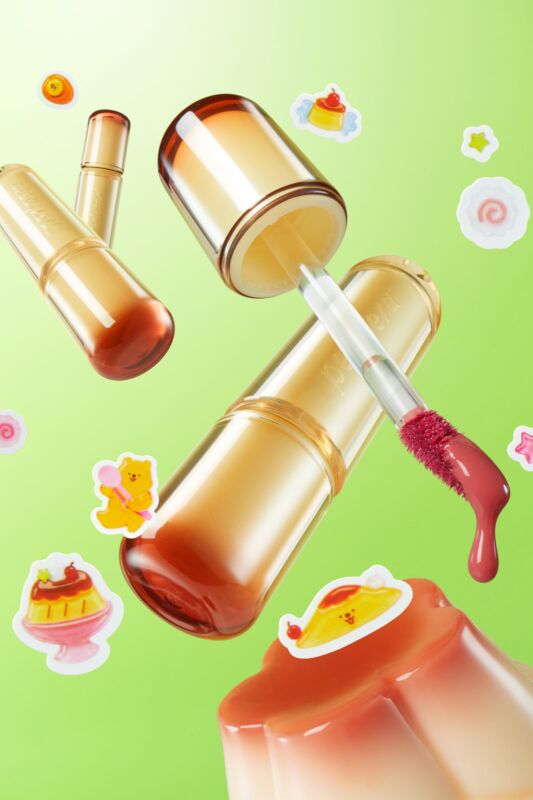 The peripera Mood Glowy Tint in a yellow pudding-inspired container, with a pudding illustration