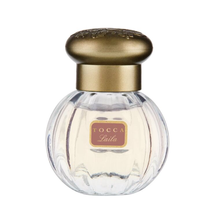 A bottle of Laila eau de parfum with a gold cap