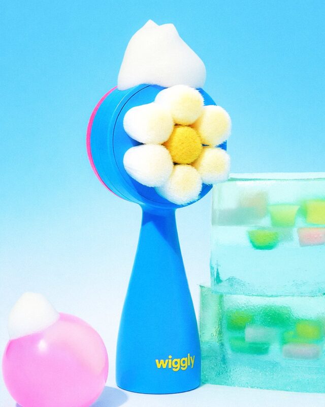 Dual Cleansing Brush - Blue with a blue handle and a flower-shaped brush