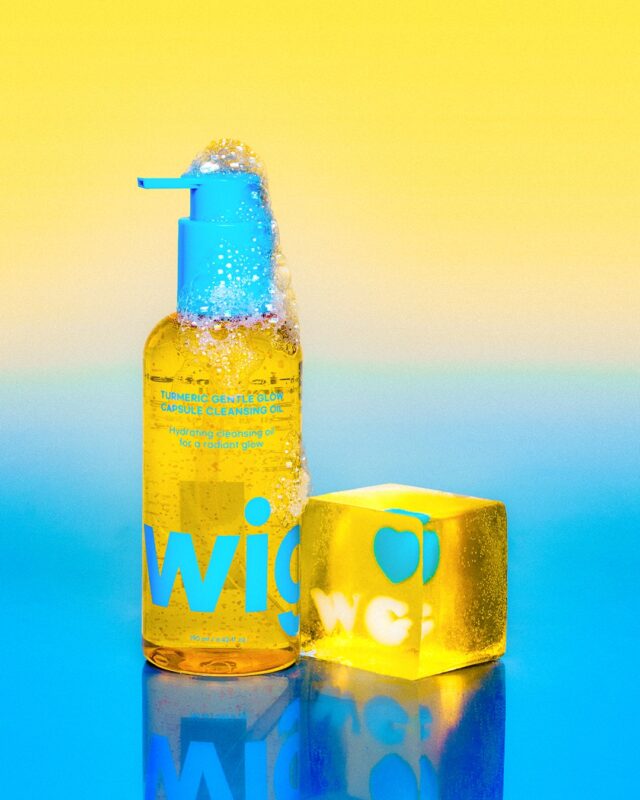 Turmeric Gentle Glow Capsule Cleansing Oil in a yellow pump bottle