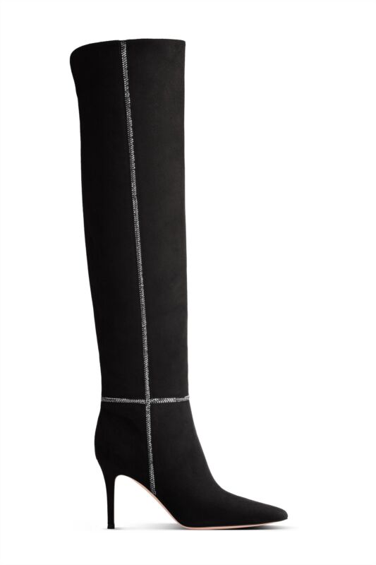 Black suede thigh-high boots with rhinestones along the seams