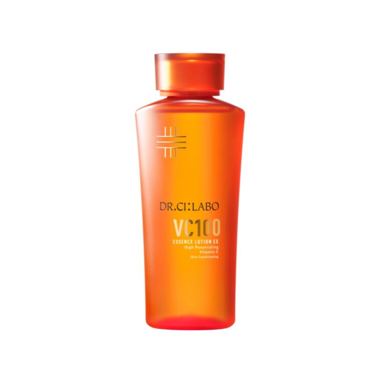 VC100 Essence Lotion EX in an orange bottle