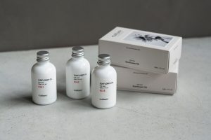 OSAJI culture サンフラワーヘアオイルのボトルとパッケージ
