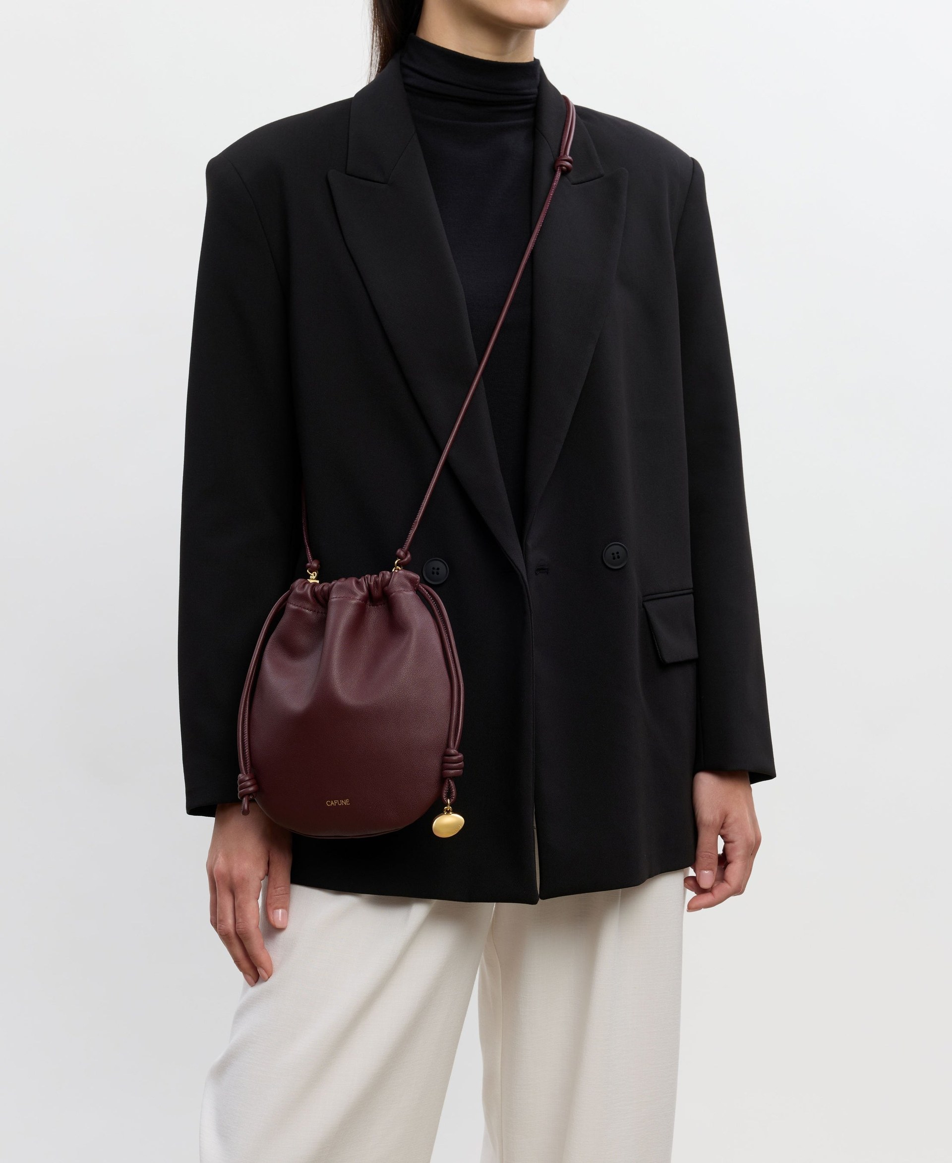 Small Lune Crossbody in Maroon worn across the body