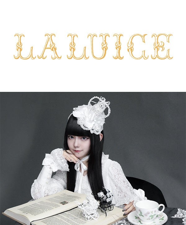 白いレースの衣装とヘッドアクセサリーを合わせたLA LUICEのビジュアル